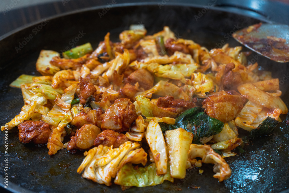 Myeongdong Dakgalbi Street specialising in local dish dakgalbi or spicy stir-fried chicken restaurants at Chuncheon , South Korea : 11 February 2023 Myeongdong Dakgalbi Street specialising in local dish dakgalbi or spicy stir-fried chicken restaurants at Chuncheon , South Korea : 11 February 2023