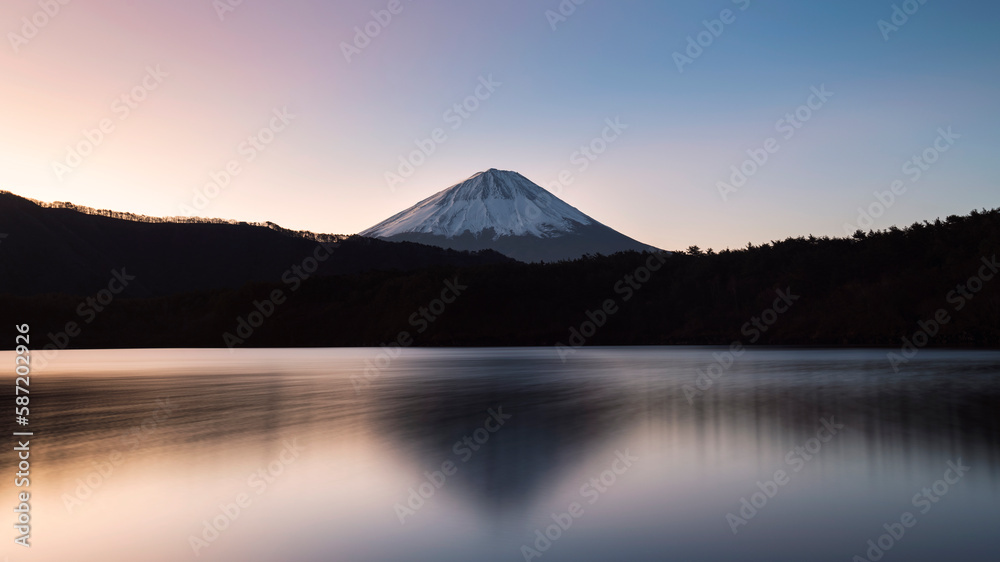 Mount Fuji at sunrise from lake Saiko, Yamanashi Prefecture, Japan Mount Fuji at sunrise from lake Saiko, Yamanashi Prefecture, Japan