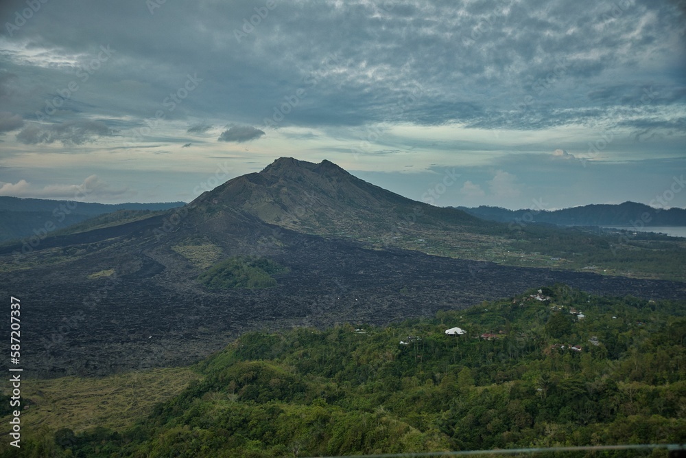 Epic view over the imposing landscape of the north of Bali in Indonesia, with its majestic mountains and green hills.