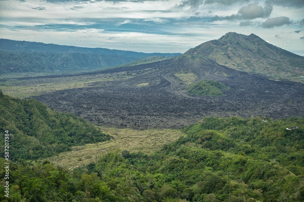 Fototapeta premium Epic view over the imposing landscape of the north of Bali in Indonesia, with its majestic mountains and green hills.