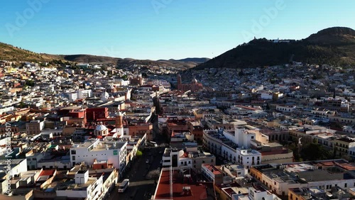 Drone shot approaching the Catedral Basílica de Zacatecas,, sunny day in Mexico photo