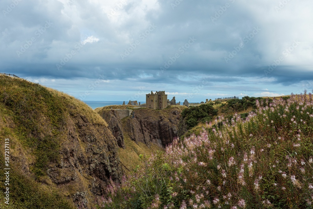 Famous Dunnottar Castle and rocky landscape in Scotland