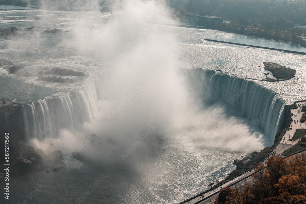 Aerial shot of Niagara Falls partly in steam due to the constant flow of water Aerial shot of Niagara Falls partly in steam due to the constant flow of water