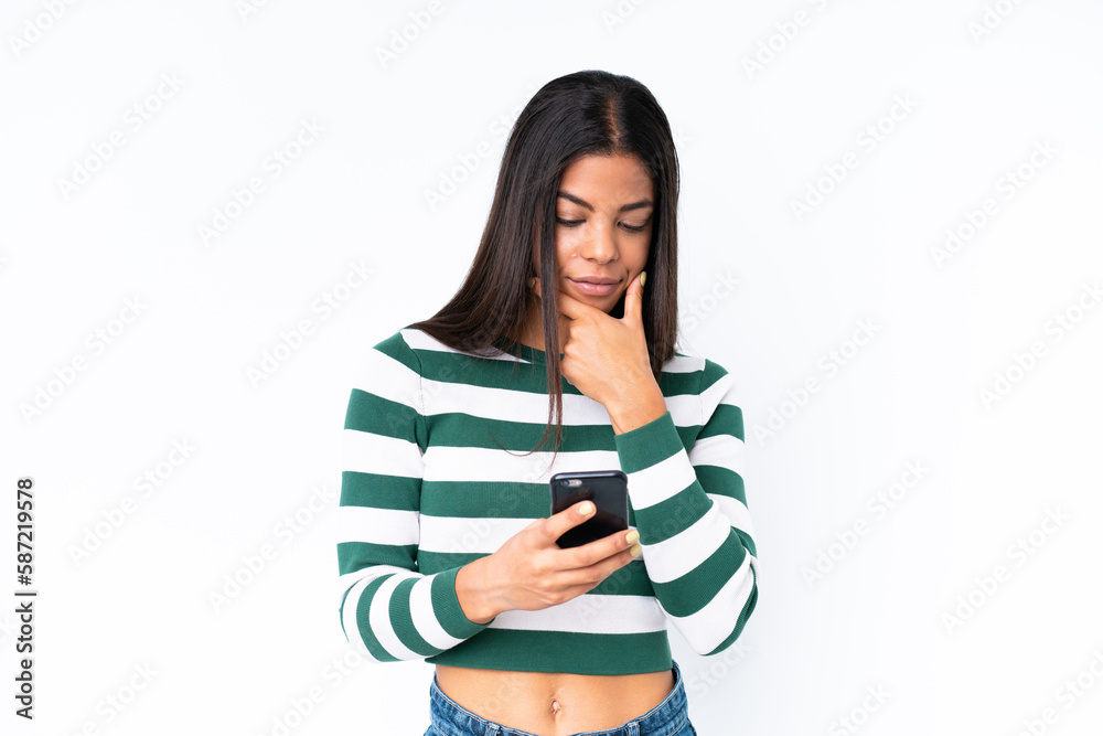 Young African American woman isolated on white background thinking and sending a message Young African American woman isolated on white background thinking and sending a message