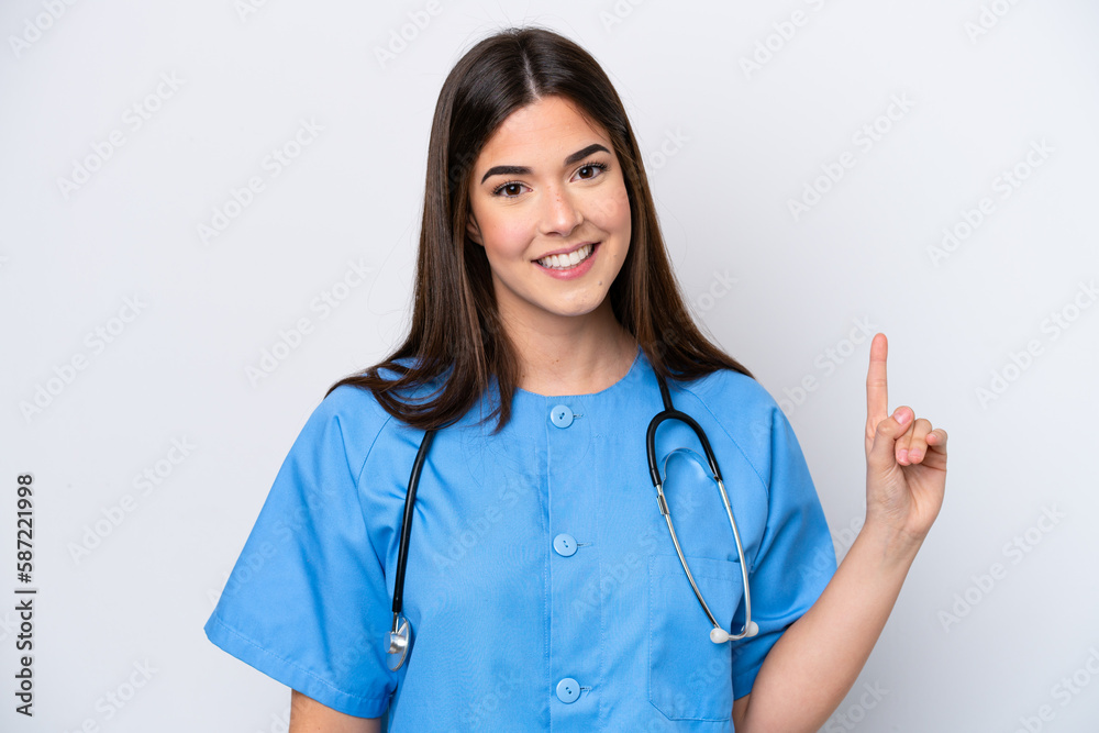Young Brazilian nurse woman isolated on white background showing and lifting a finger in sign of the best Young Brazilian nurse woman isolated on white background showing and lifting a finger in sign of the best