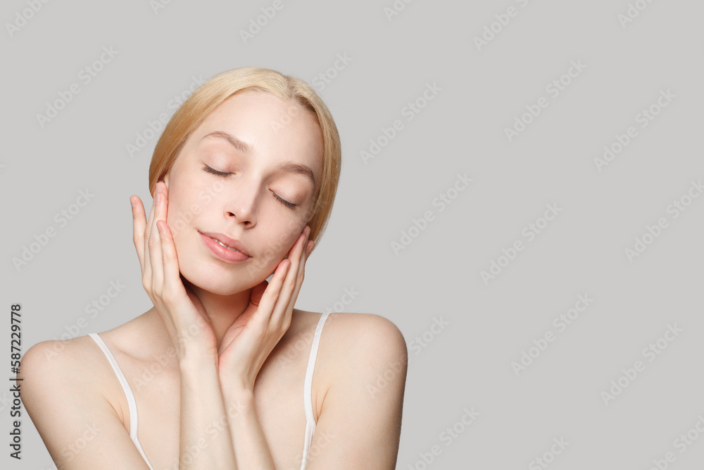 Female face. Young woman with healthy clear skin. Eyes closed. Facial treatment, skincare and cosmetology concept Female face. Young woman with healthy clear skin. Eyes closed. Facial treatment, skincare and cosmetology concept