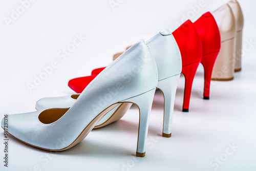 Shoe for women. Beauty and fashion concept. Fashionable women shoes isolated on white background. Stylish classic women leather shoe. High heel women shoes on white background photo