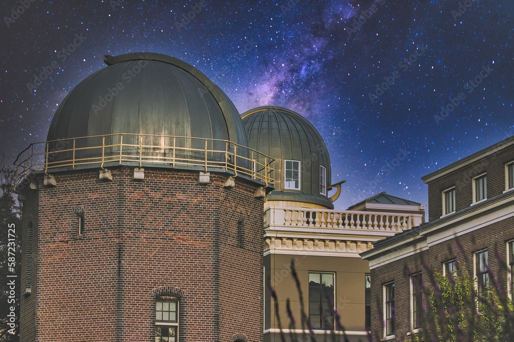 Fototapeta premium Leiden Astronomical Observatory with a starry sky in the background, Leiden, the Netherlands