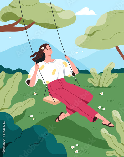 Happy woman sitting on swings in nature. Young carefree girl chilling outdoor...