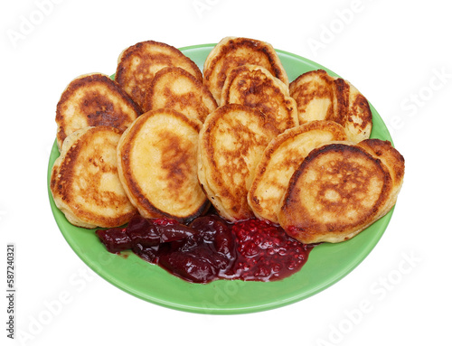 Homemade cottage cheese pancakes with jam for breakfast isolated