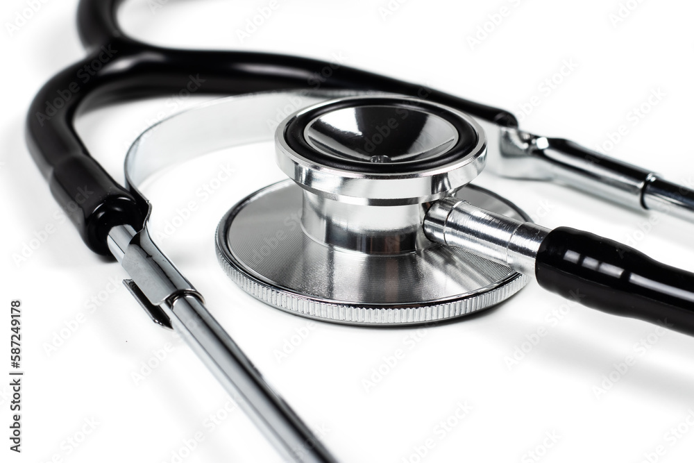 Black stethoscope on white background. Healthcare copcept. Black stethoscope on white background. Healthcare copcept.
