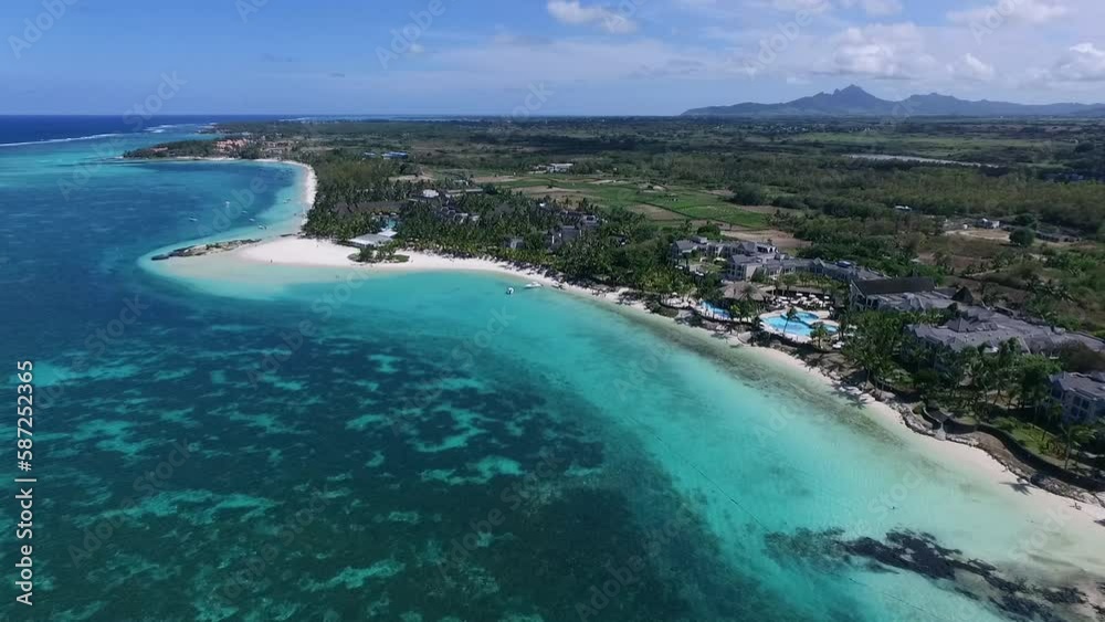 Belle Mare Luxury Beach in Mauritius. Landscape and Indian Ocean in Background. Beautiful Beach and Clear Water Belle Mare Luxury Beach in Mauritius. Landscape and Indian Ocean in Background. Beautiful Beach and Clear Water