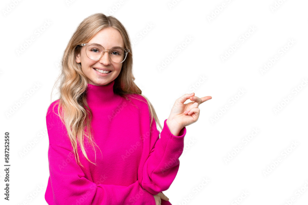 Young English woman over isolated background pointing finger to the side Young English woman over isolated background pointing finger to the side