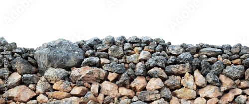 Close up view of an old stone wall of stacked rocks isolated on empty background