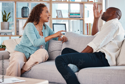 Fotografija Couple, fight and argue on sofa for marriage problems, breakup or bad communication in lounge