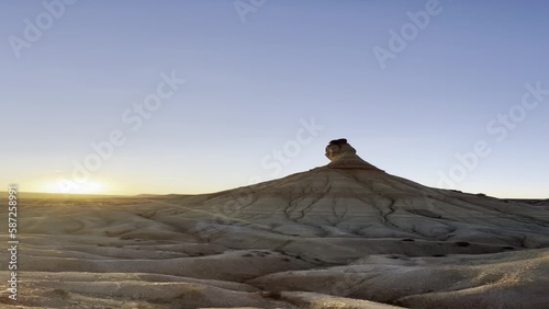vertical video in the bardenas reales, recorded plane from top to bottom, giant desert, tourist site, vacations in a van