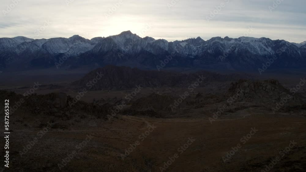 Aerial Beautiful View Of Snowy Tranquil Mountains, Drone Flying Over Landscape During Sunset - Alabama Hills, California Aerial Beautiful View Of Snowy Tranquil Mountains, Drone Flying Over Landscape During Sunset - Alabama Hills, California