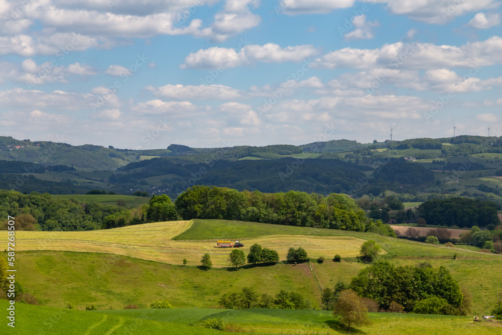 beautiful landscape in summer with fields and meadows in Odenwald region in Germany