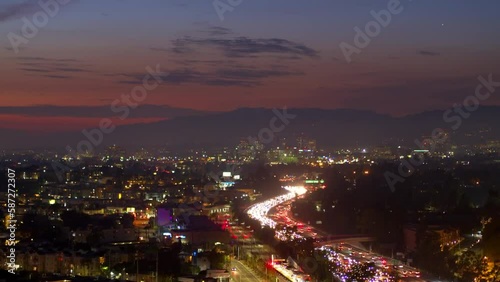 Wallpaper Mural Aerial Panning Shot Of Cars Moving On Roads Amidst Illuminated Houses In City At Night - Culver City, California Torontodigital.ca