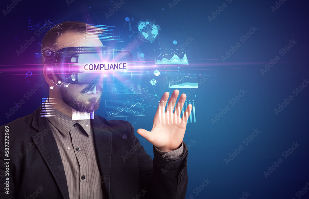 Businessman looking through Virtual Reality glasses