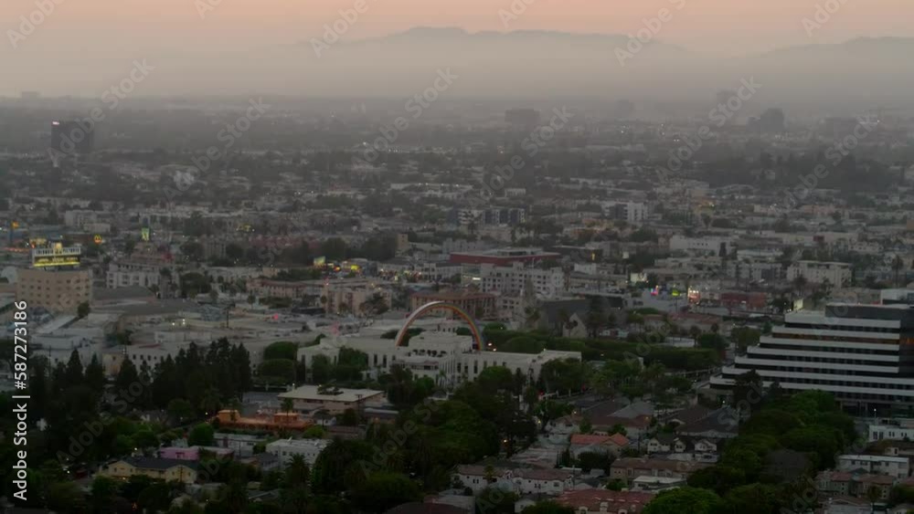 Aerial Backward Shot Of Television Studio Amidst Houses In City During Sunset - Culver City, California Aerial Backward Shot Of Television Studio Amidst Houses In City During Sunset - Culver City, California