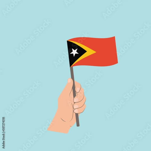 Free Download Flag of East Timor, Hand Holding flag - GFXLoad