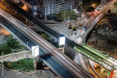 Overhead view of road traffic at night in an urban setting