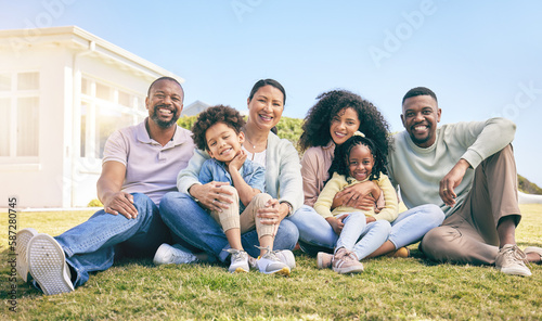 Family, portrait and generations, relax together on grass with happiness, grandparents and parents with children. Happy people outdoor, summer and sitting on lawn, love and bonding with smile © Charlize D/peopleimages.com