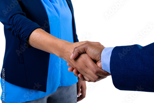 Mid section of businessman and businesswoman shaking hands against white background