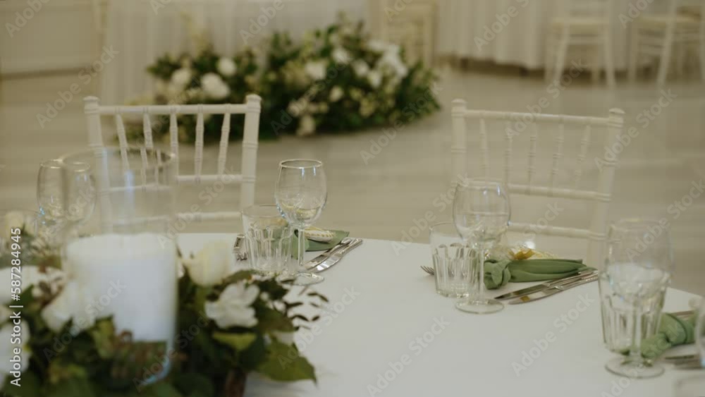 Table Without Apple Round table without food is served with plates, napkins, glasses and ...