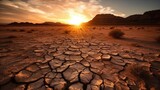 Cracked soil due to drought and lack of rain. Dry brittle earth in a desert at sunset. (Generative AI)