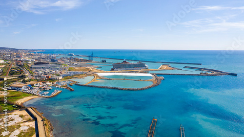 Aerial view of the port of Civitavecchia, near Rome, Italy. There are large cruise ships and ferries ready to go. © Stefano Tammaro