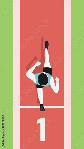 A man is running in a track and is wearing a blue shirt. Man on running track. Top view of running track.