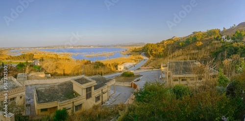 Kallar Kahar Lake, Chakwal District, Punjab, Pakistan - December, 25, 2018: Famous for salt water Lake and beautiful species of birds, its a charming place with good air. photo