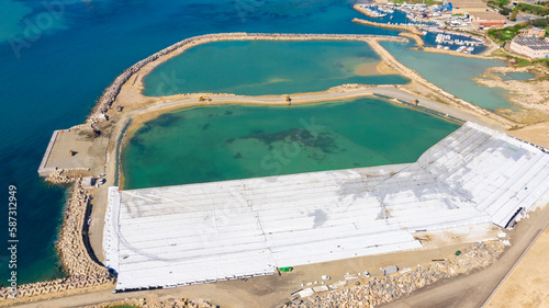 Aerial view of Mattonara, an archaeological area located in Civitavecchia near Rome, Italy. The area has been affected by marine erosion, environmental degradation and heavy human interference.