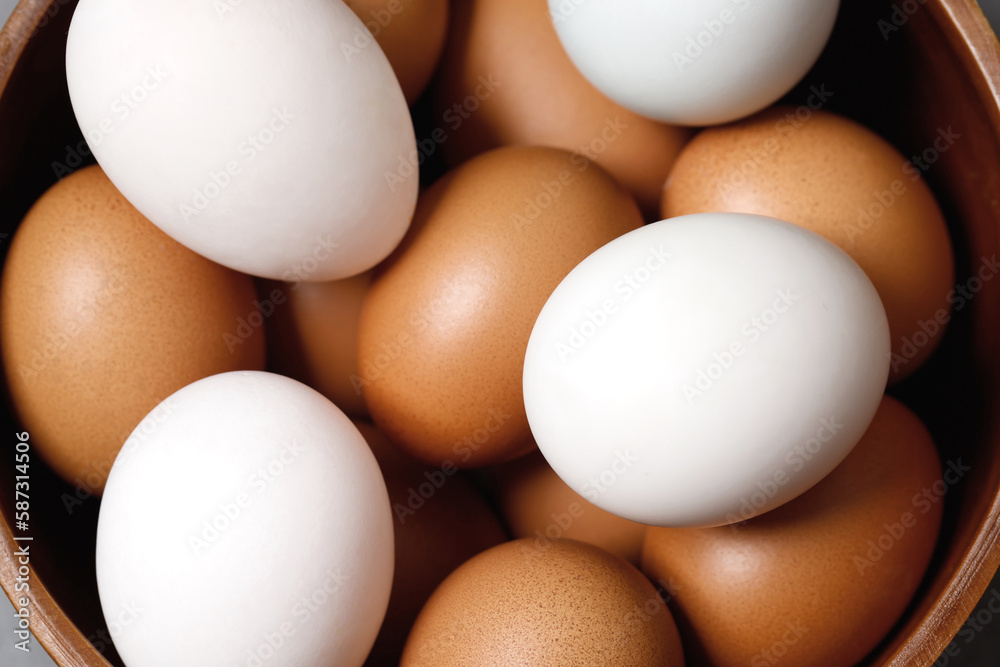 Top view chicken eggs and white duck eggs ready for breakfast Top view chicken eggs and white duck eggs ready for breakfast