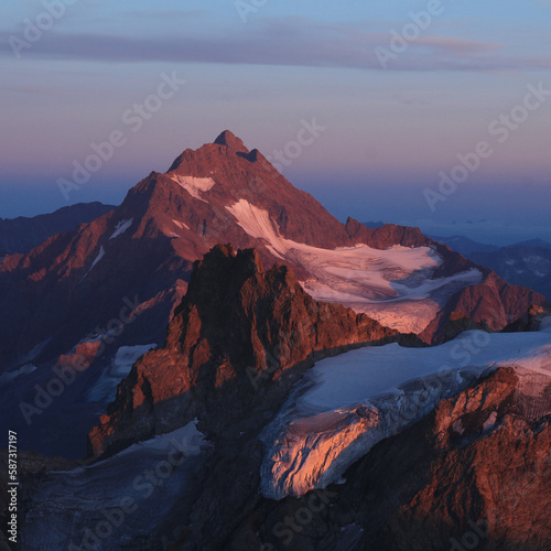 High mountain in purple evening light, view from mount Titlis, Switzerland.