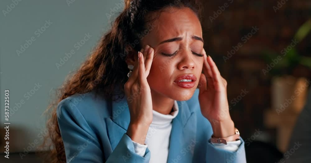 Stress, headache and pain with a business woman in the office, rubbing ...