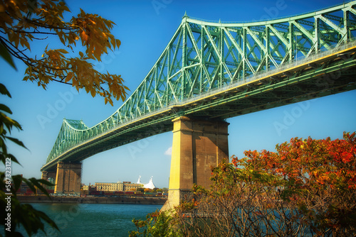 View of Jacques Cartier Bridge in Montreal during fall season in Quebec province in Canada © pink candy