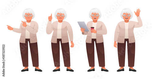 Grandmother stands with a tablet in her hand and a glass of coffee, points to something, waves her hand. Elderly woman in full growth character set. An old white woman with gray hair in glasses