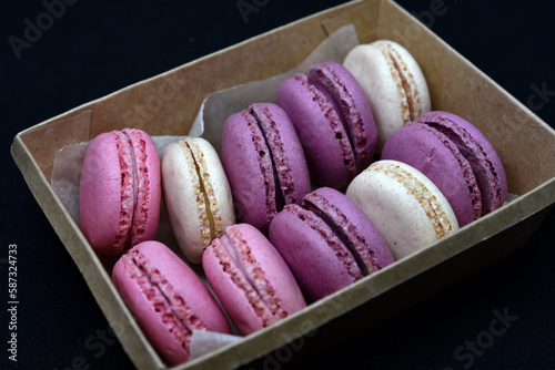 Cardboard box with Macaroon cookies. Colorful almond sweet cookies.