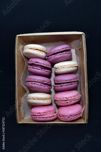 Cardboard box with Macaroon cookies. Colorful almond sweet cookies.