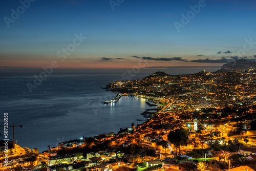 Aerial cityscape of Illuminated Funchal, Madeira at twilight
