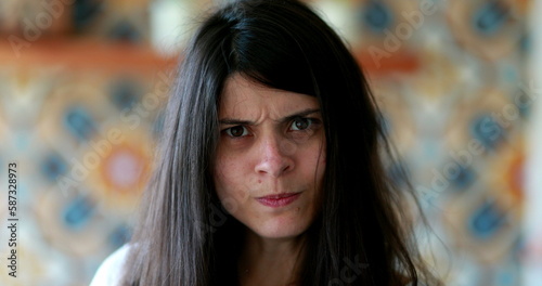 Upset woman reaction, 30 year old portrait of angry person staring at camera
