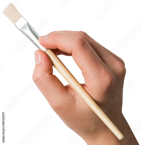 Hand holding paintbrush