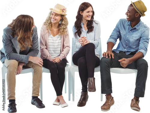 Smiling business people sitting on chair 
