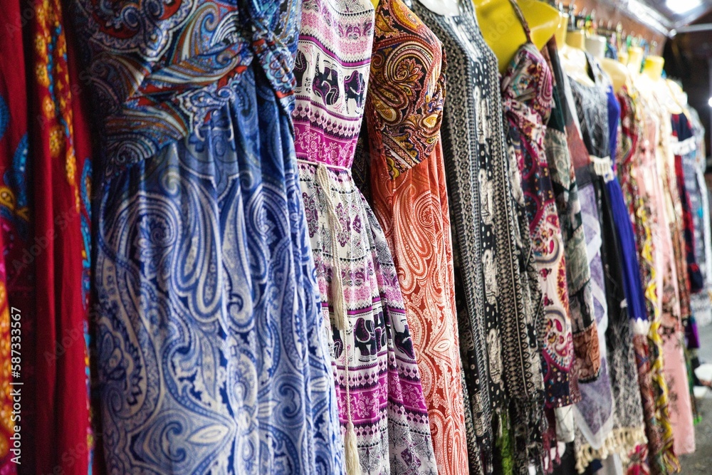 Colorful hanging dresses on Khaosan Road in Bangkok, Thailand.