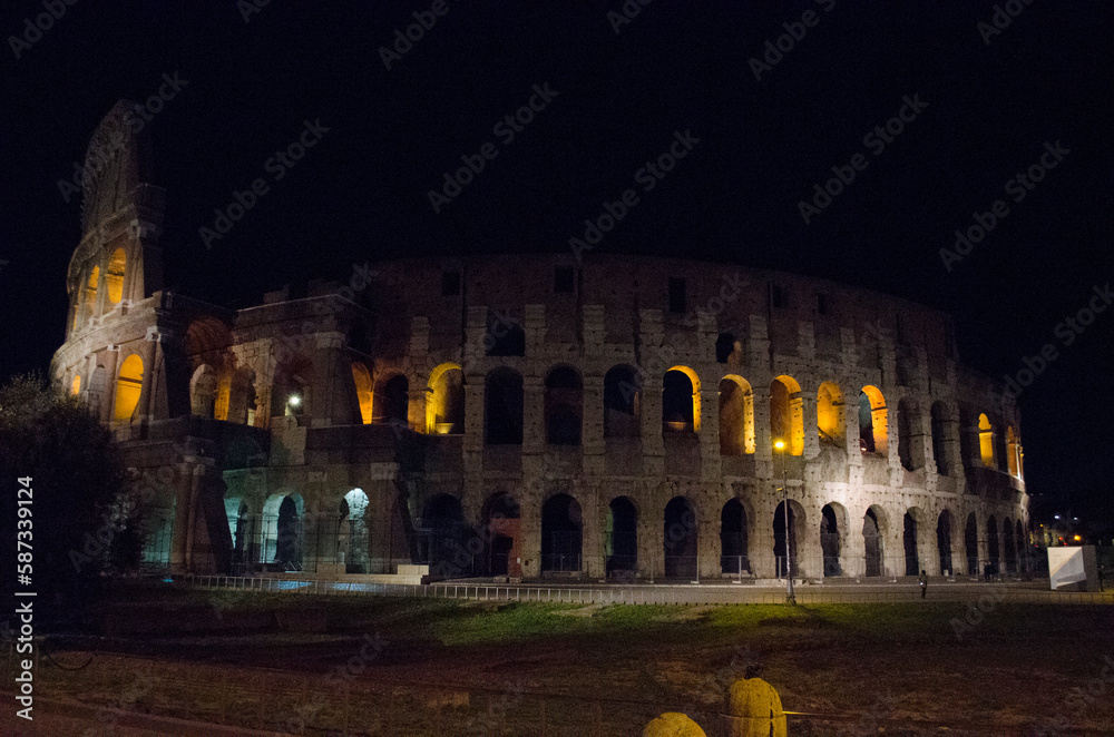 Colosseum - amphitheater, an architectural monument of Ancient Rome. View of the Colosseum in the evening.