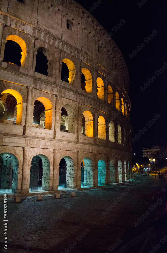 Colosseum - amphitheater, an architectural monument of Ancient Rome. View of the Colosseum in the evening.