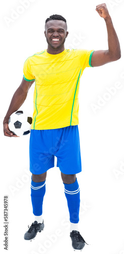 Football player smiling while clenching fist